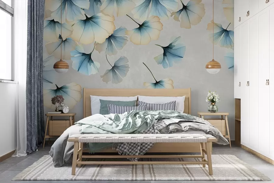 Valokuvatapetti Pastellisävyiset sinisen ja keltaisen ginkgon lehdet, joiden hennot terälehdet leijuvat ilmassa teksturaalista taustaa vasten w08578v1