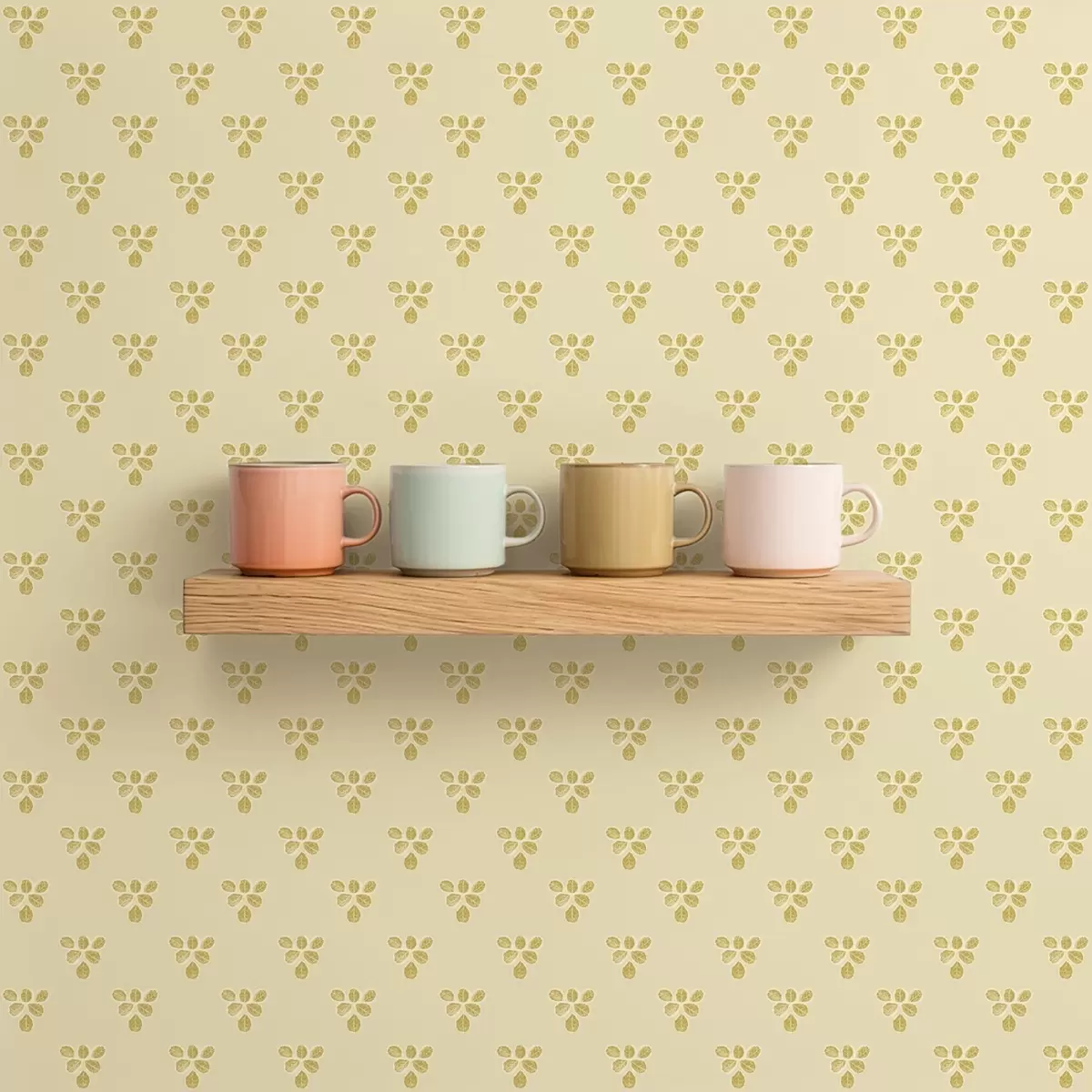 Taustakuva Pieni toisto: kolmen lehden rypäs kermanbeigen värisellä pohjalla a00848